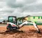 Black and white BOBCAT Mini Excavator with Reduced Tail Swing