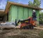 Red, black and orange DITCHWITCH 300-600 lb. Compact Track Loader