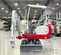 White and red Takeuchi mini excavator